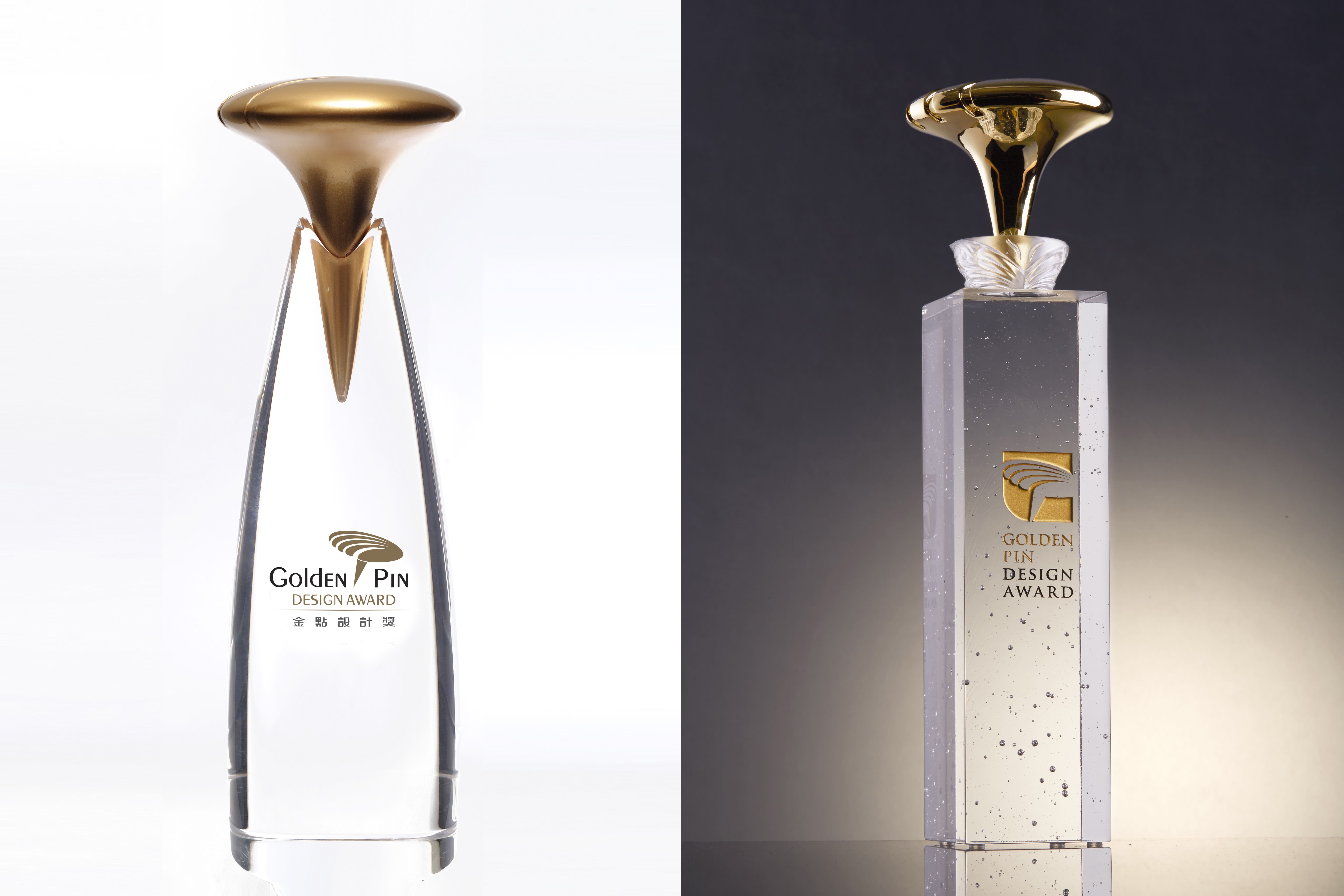 The left is the 2009-2014 Golden Pin trophy; the right is the 2014-2021 edition.